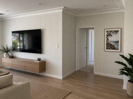 VJ panelled living room wall with mounted TV