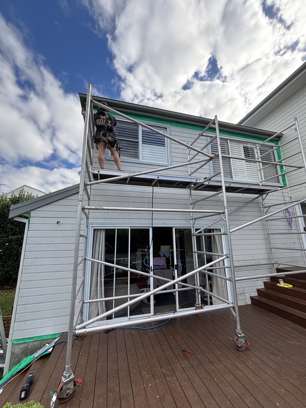 Goat Carpentry at work on exterior eaves
