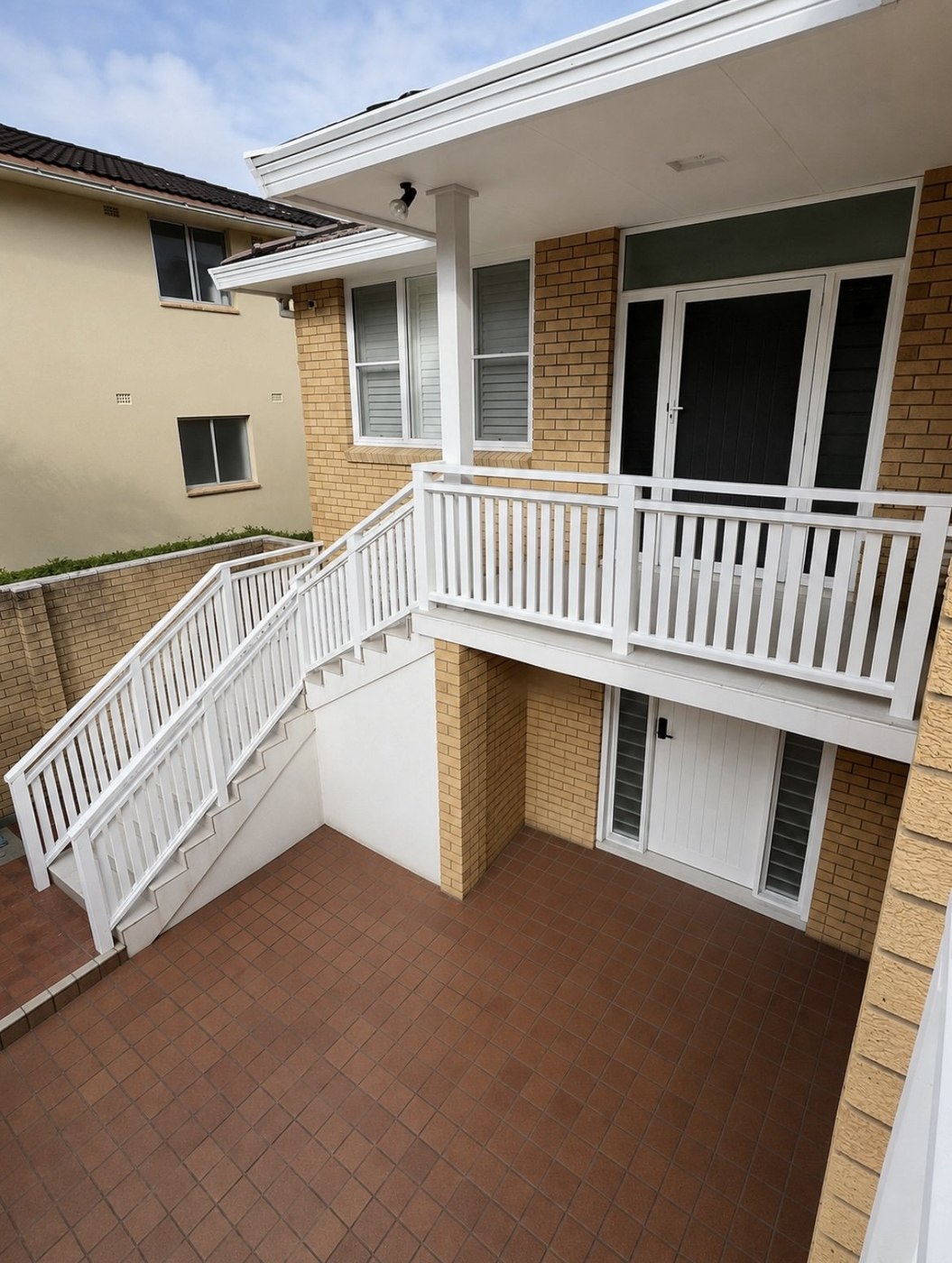 After: rear extension with finished white timber balustrade