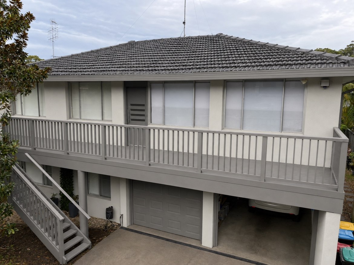 After: finished grey composite upper deck with balustrade and new stairs