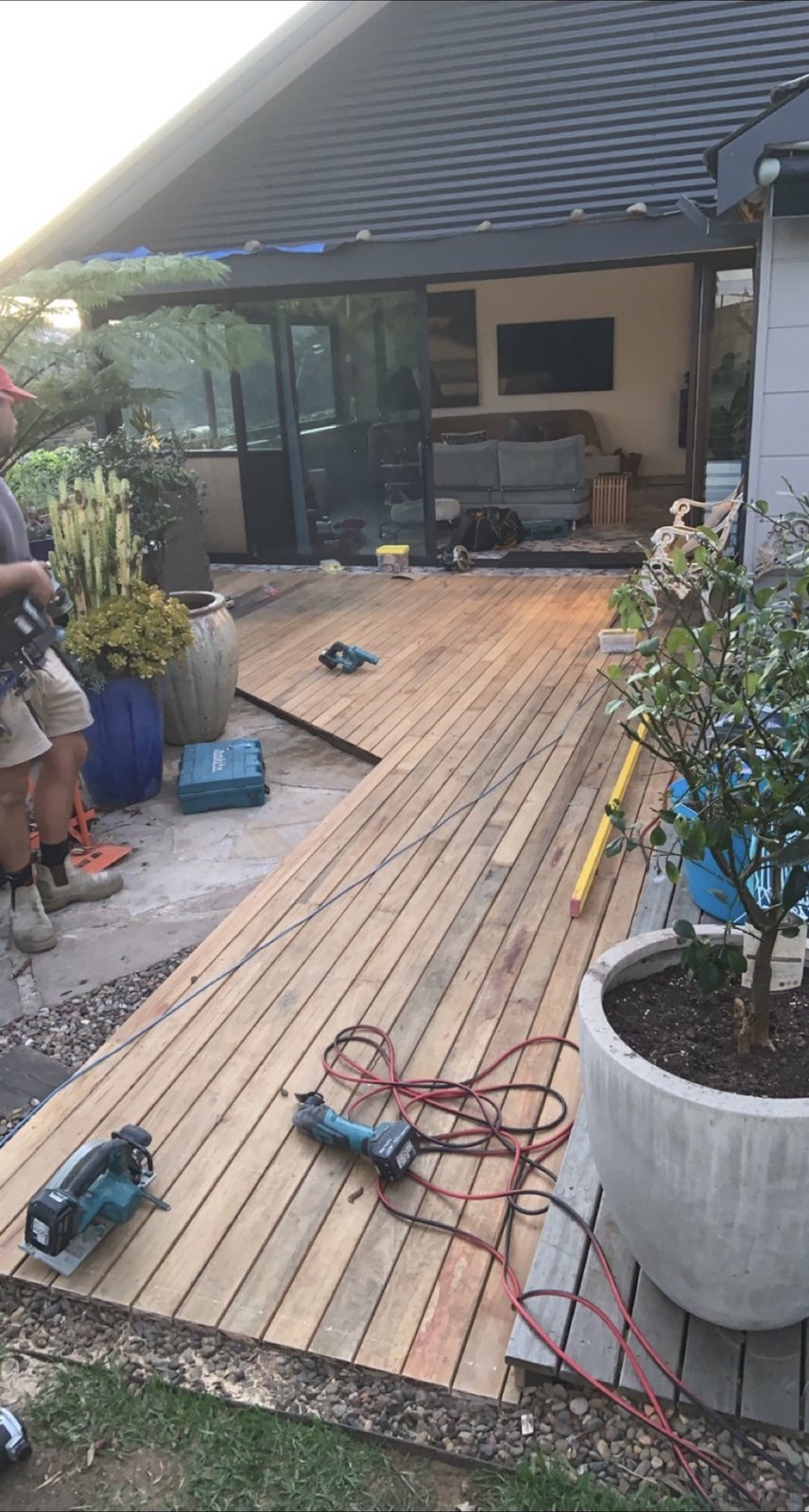 Deck under construction, A-frame roof house