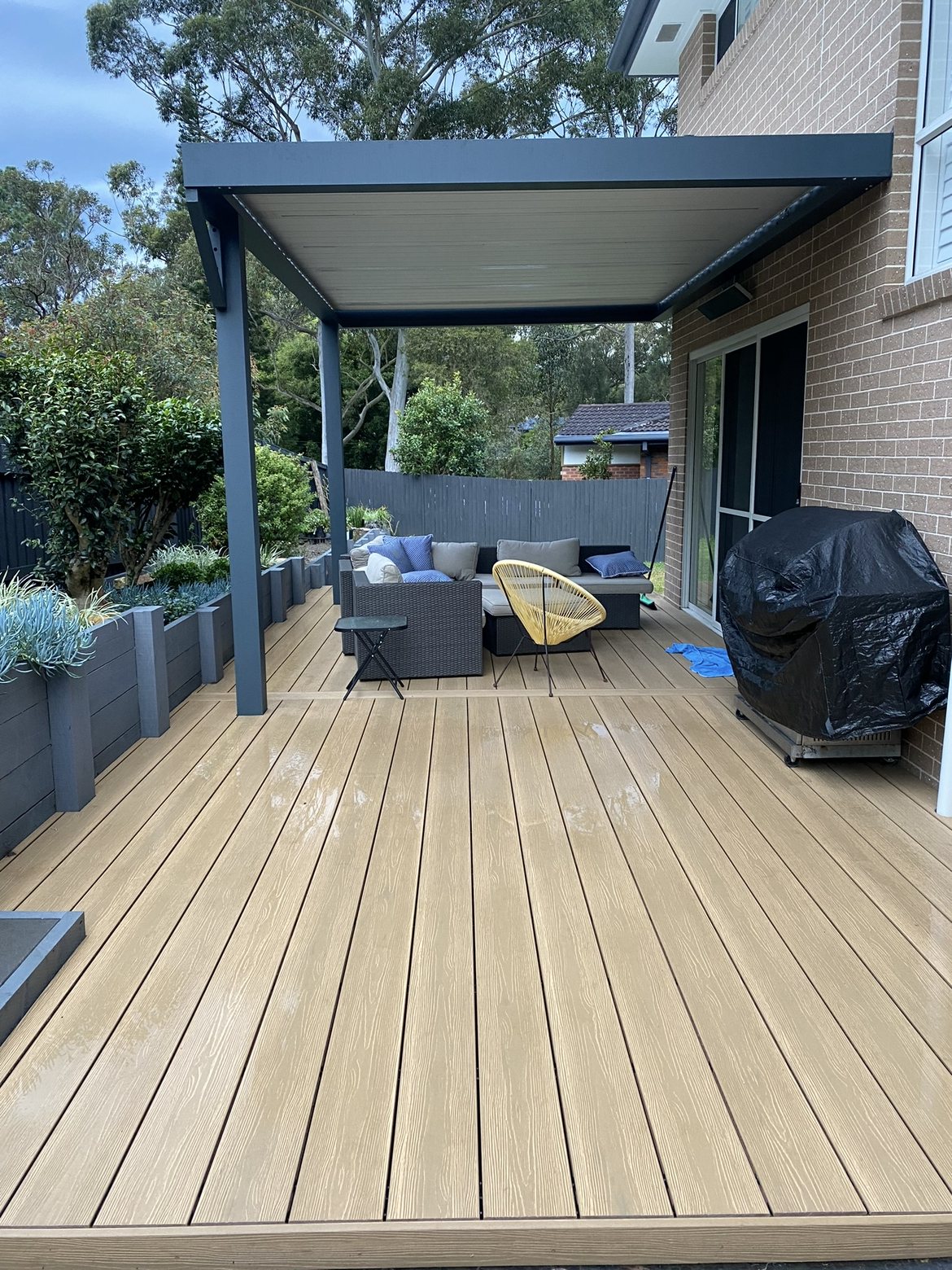 Deck with pergola, outdoor lounge and BBQ