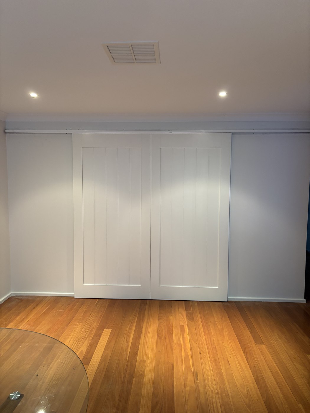 White VJ panelled sliding barn doors