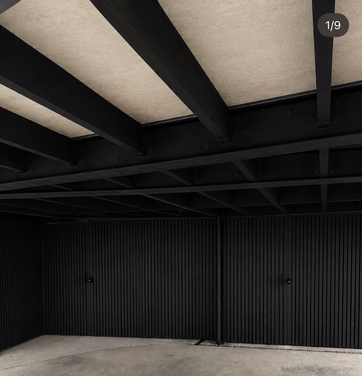 Carport converted into an enclosed storage space, steel frame