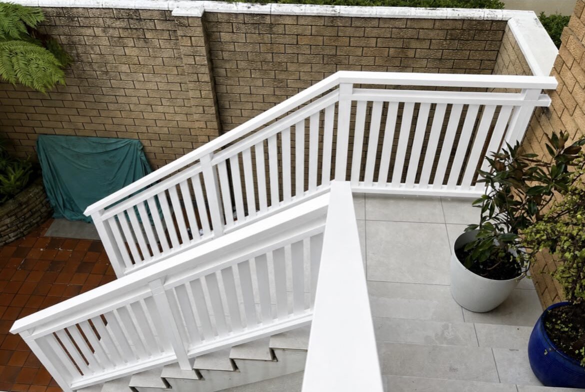 White Hampton-style balustrade staircase, aerial view