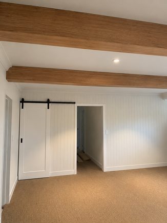 Timber beam feature with sliding barn door
